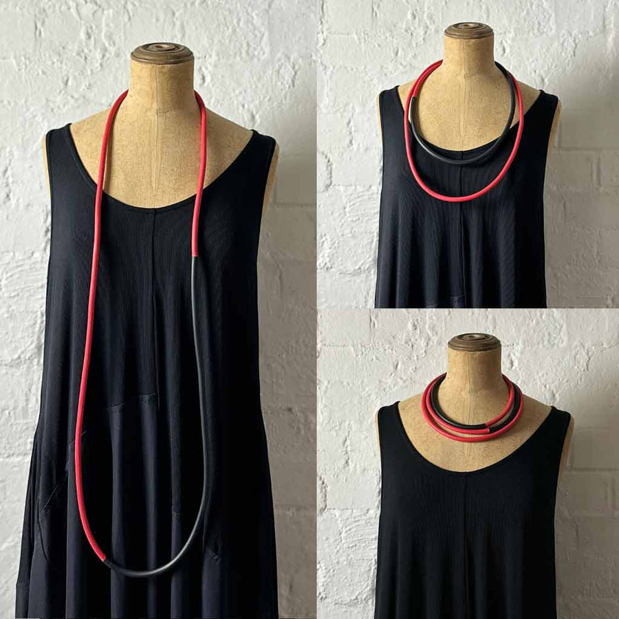 Long red and black statement necklace