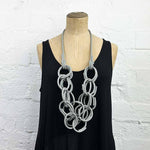 Grey long drop lightweight rubber necklace