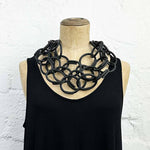 Black coloured rubber chain loop necklace