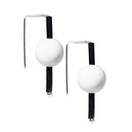 White rubber earrings made with sterling silver. Bold, fun design.