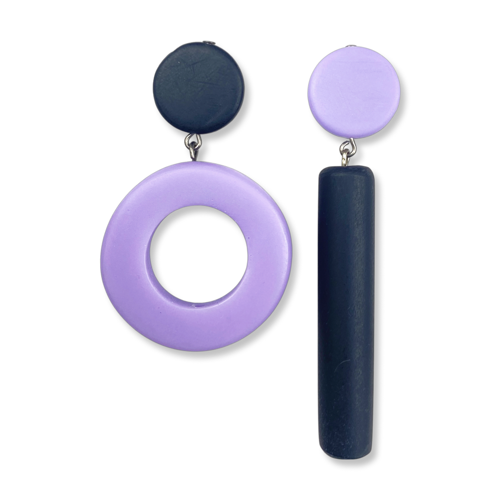 Asymmetrical blue and purple dot and dash earrings on a white background