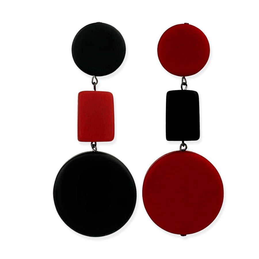 black and red dangle earrings on a white background