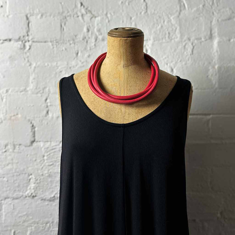 red triple strand rubber, modern necklace on mannequin
