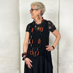 Tan and black recycled rubber long necklace with matching earrings and bangles.