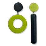 Asymmetrical black and green dot and dash earrings on a white background