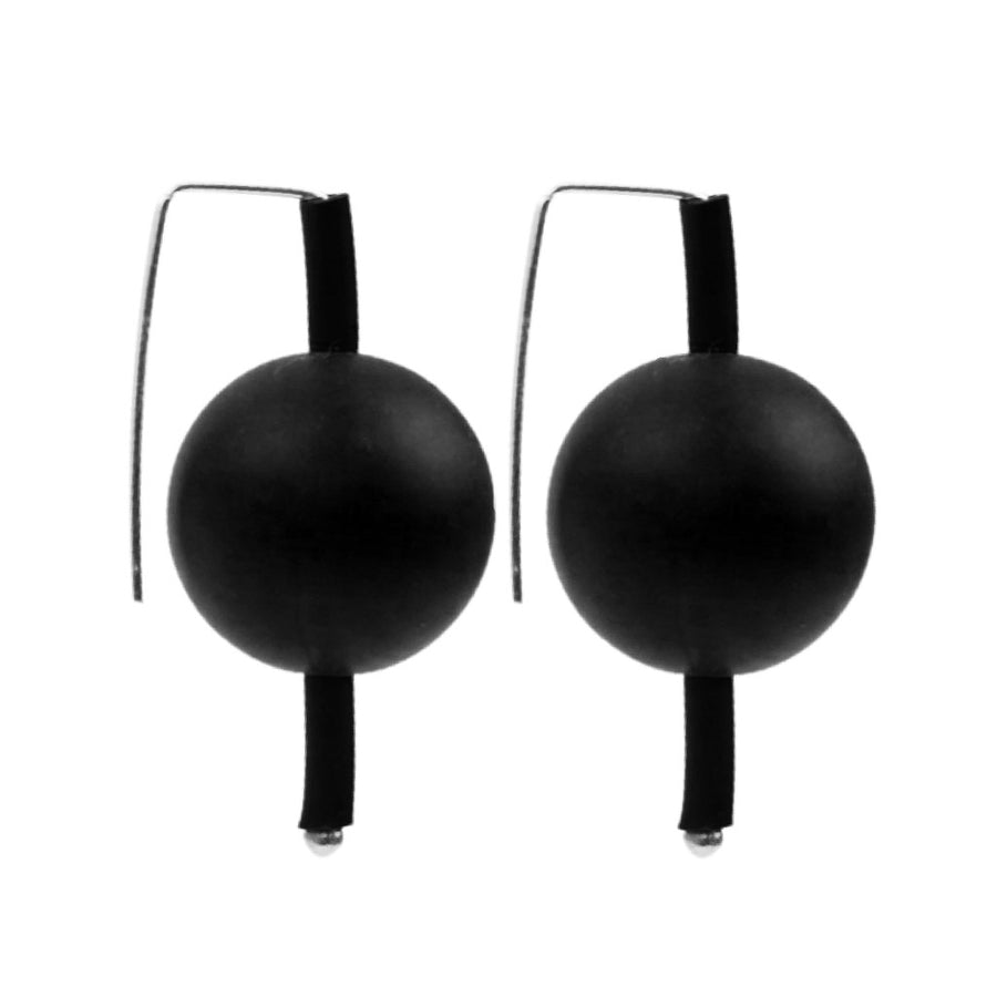 black supersized earrings on a white background