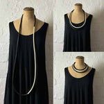Long white and black statement necklace