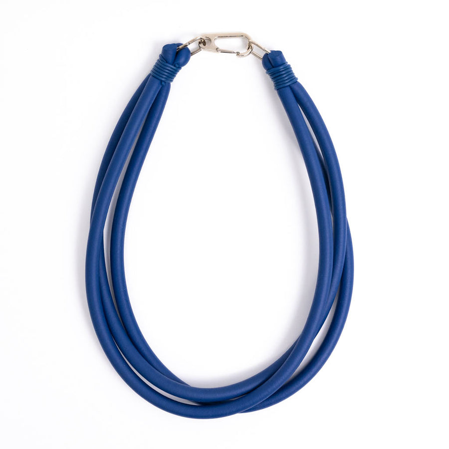 blue triple strand rubber, modern necklace by Frank Ideas on a white background