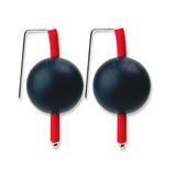 black and red supersized earrings on a white background