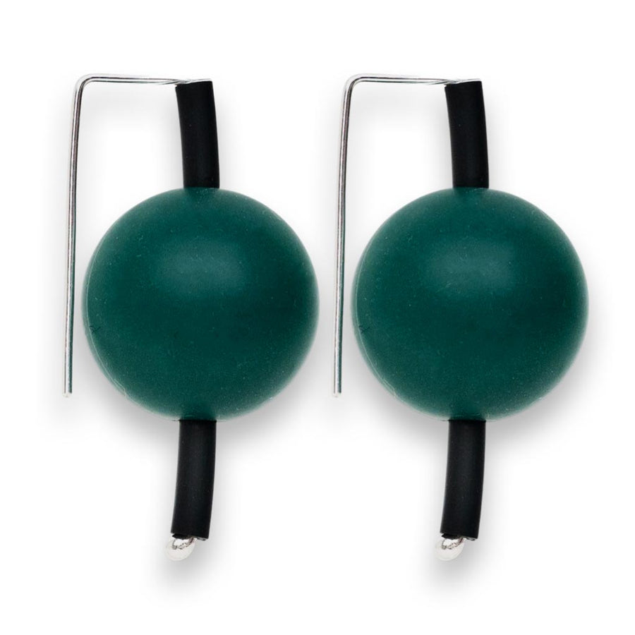 dark green supersized earrings on a white background