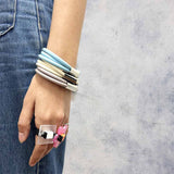 slim rubber, triple strand bangle with chrome