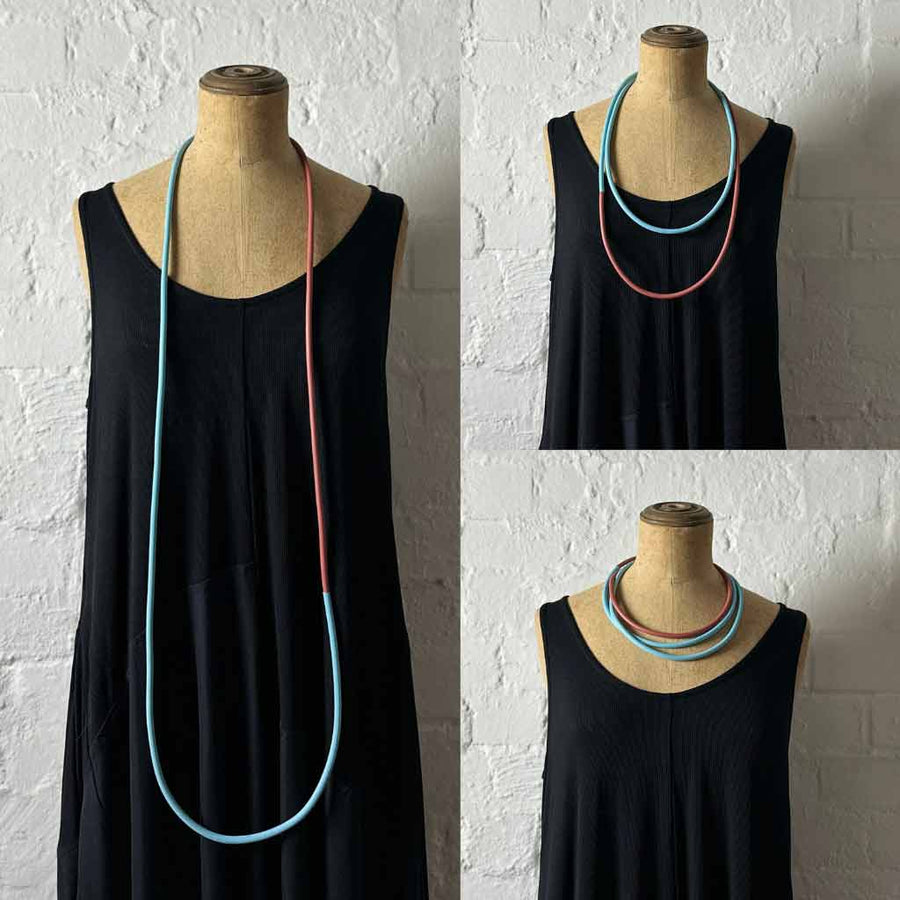 mannequin showing long statement necklace
