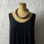 olive triple strand rubber, modern necklace on mannequin