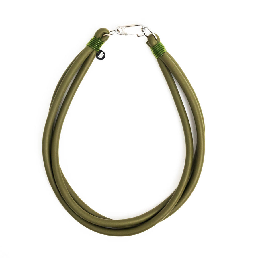 olive triple strand rubber, modern necklace by Frank Ideas on a white background