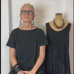 wooden pebble dangling earrings demonstration in a video