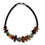 wooden green phanton necklace on a white background