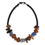 wooden and blue pebble necklace on a white background