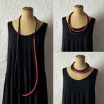 Mannequin showing ways to wear the two toned statement necklace