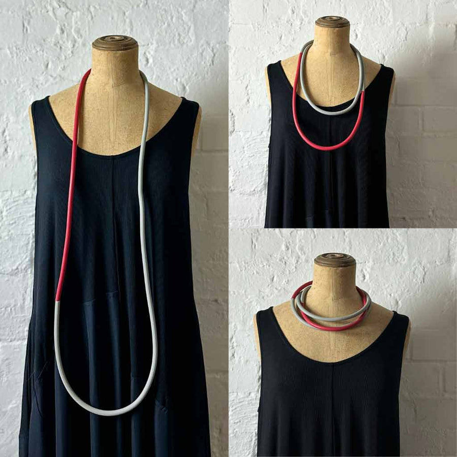 Mannequin showing ways to wear long rope styled statement necklace