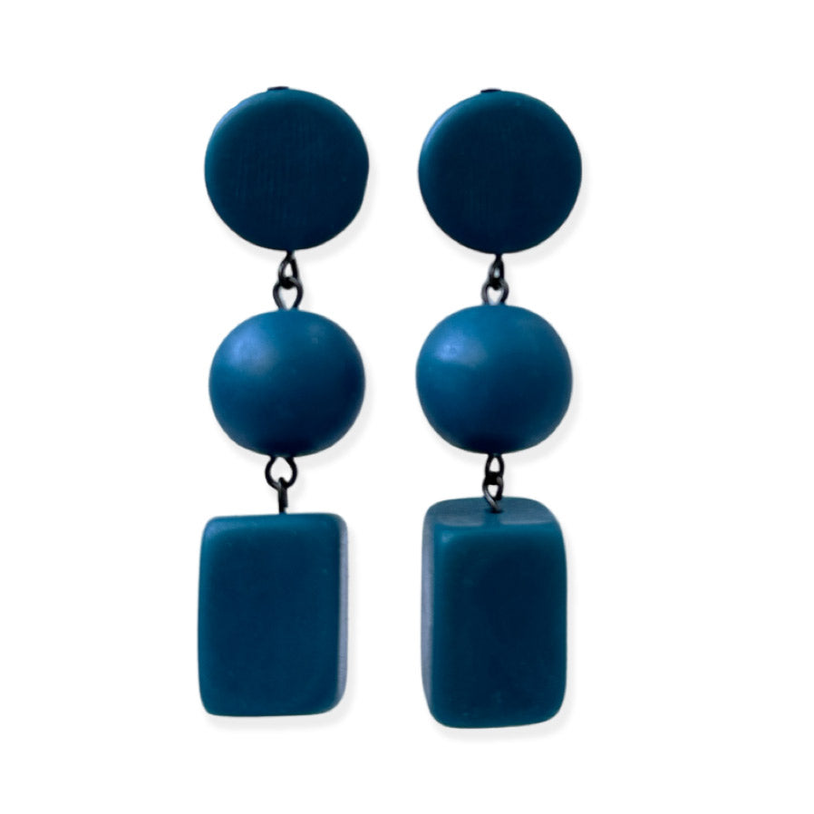 teal dangling earrings on a white background