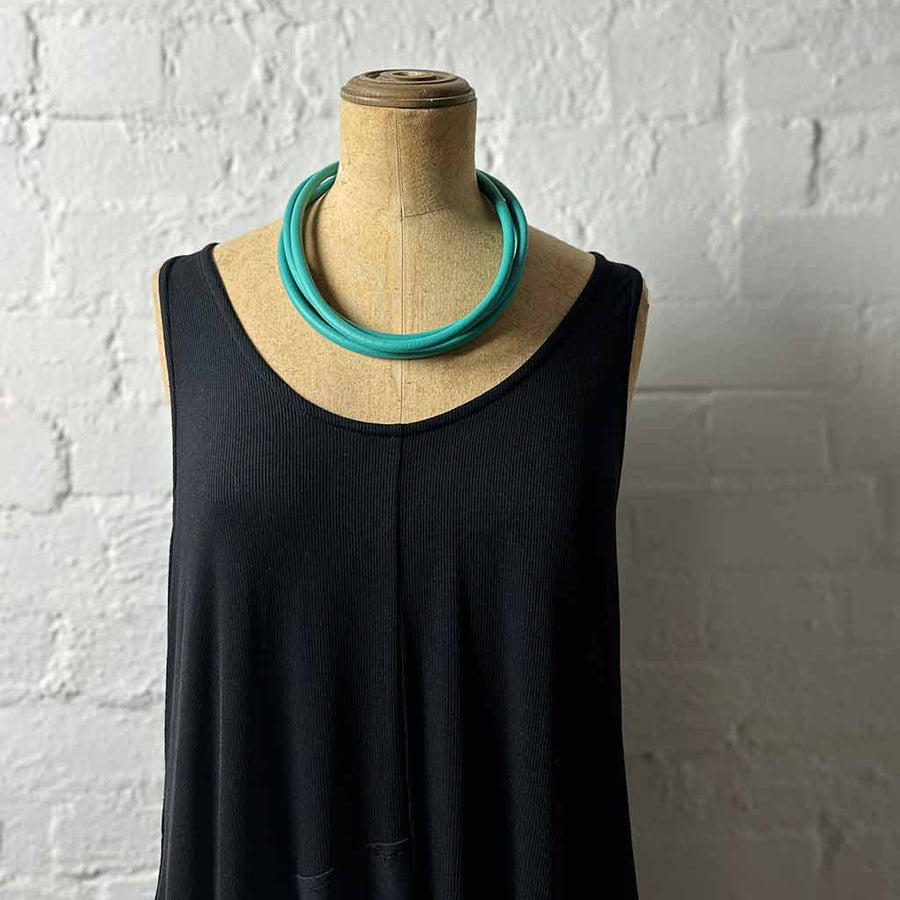 teal triple strand rubber, modern necklace on mannequin