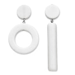 Asymmetrical white dot and dash earrings on a white background