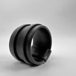 rubber bangle on a grey background