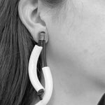 white earrings made from recycled acrylic