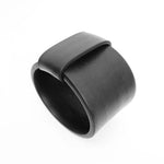 wide black bangle on a white background