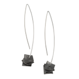 silver drop earrings with dark square disks on a white background