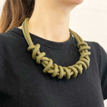 woman wearing green/olive twist necklace