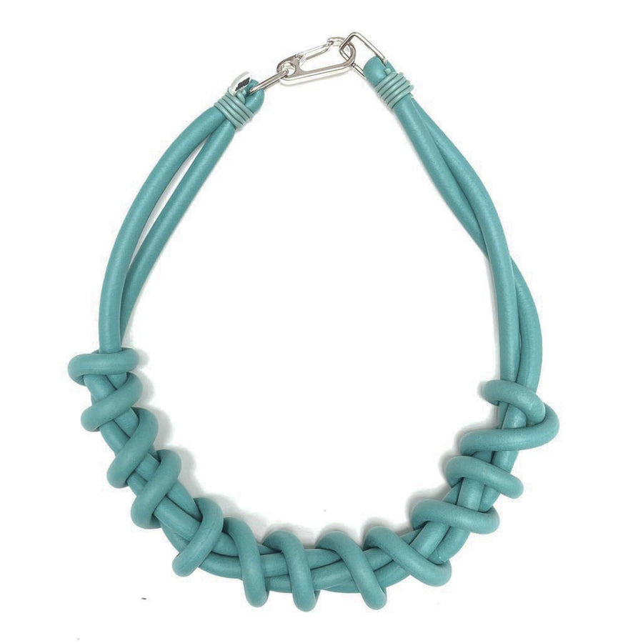 teal twist necklace on a white background