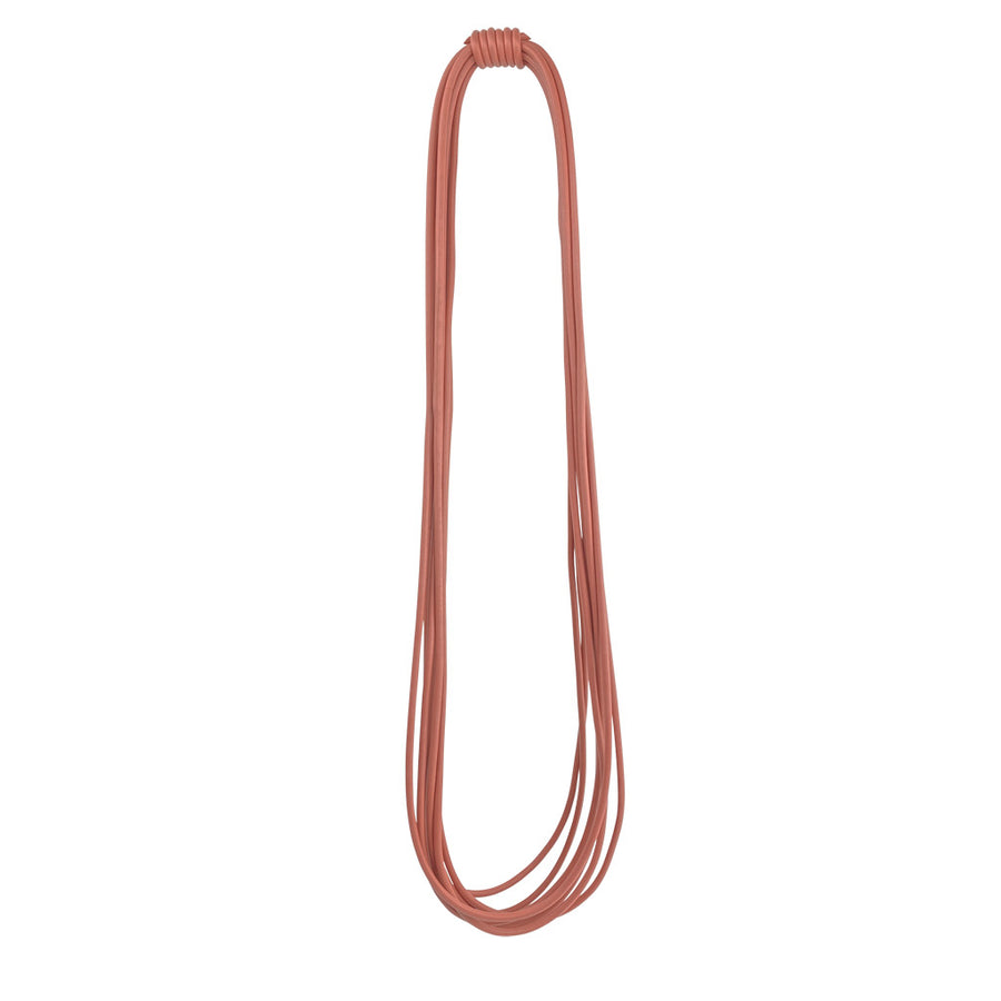 long brick-colored thick rubber necklace on a white background