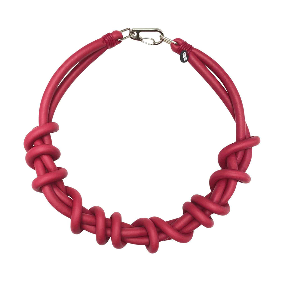 red twist necklace on a white background