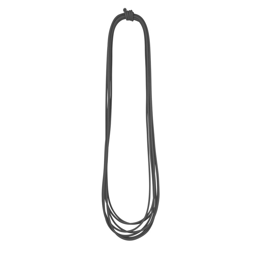 long black rubber necklace on a white background