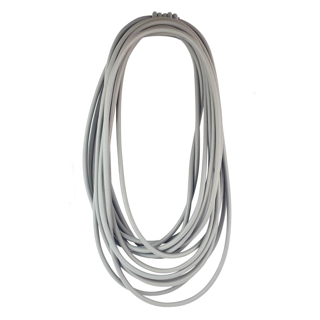 long grey rubber necklace on a white background