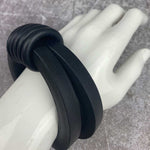 Architectural rubber bangle by Frank Ideas