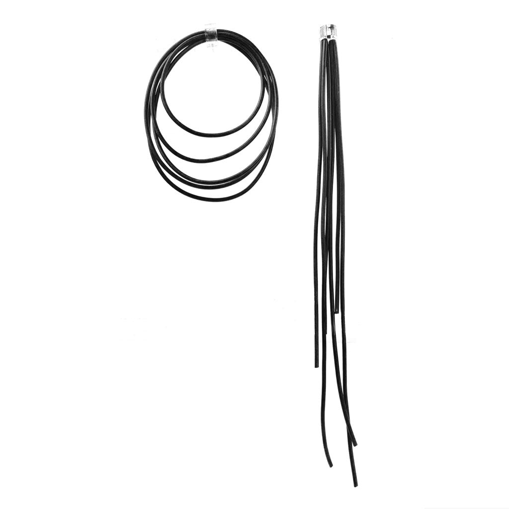 black asymmetric rubber earrings on a white background