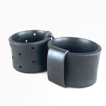 wide rubber bangles on a white background