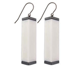 white tower earrings  on a white background