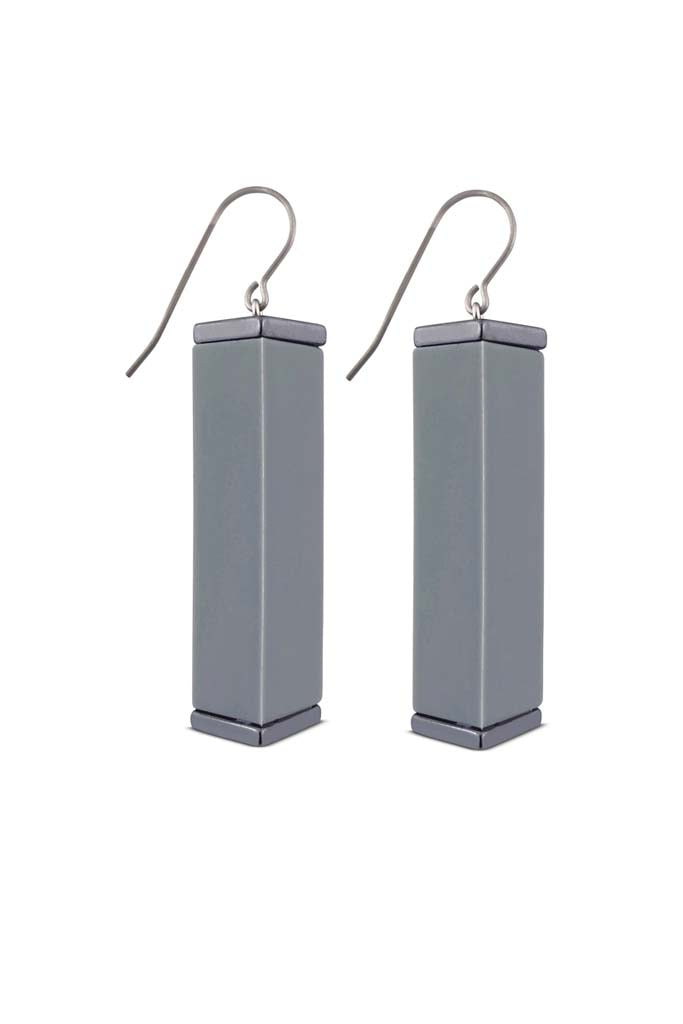 grey tower earrings on a white background