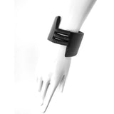 black rubber cuff bangle on a model