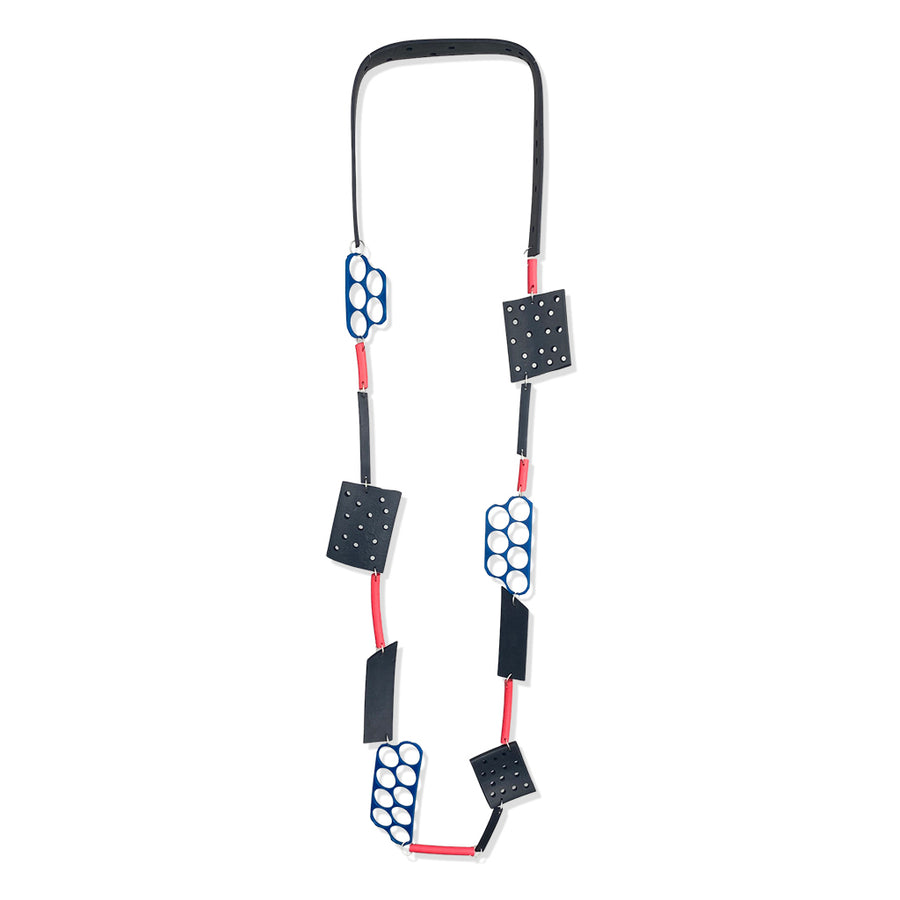 Black arty segmented necklace made from recycled rubber, red and blue