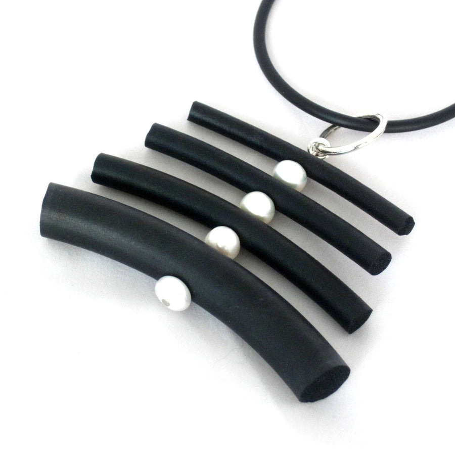 rubber and pearl pendant