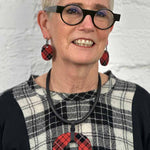 Model wearing red tartan perspex earrings and necklace for Frank Ideas