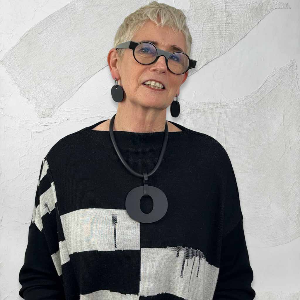 Rowan wearing reversible perspex O necklace and perspex earrings for Frank Ideas