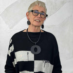 Rowan wearing reversible perspex O necklace and perspex earrings for Frank Ideas
