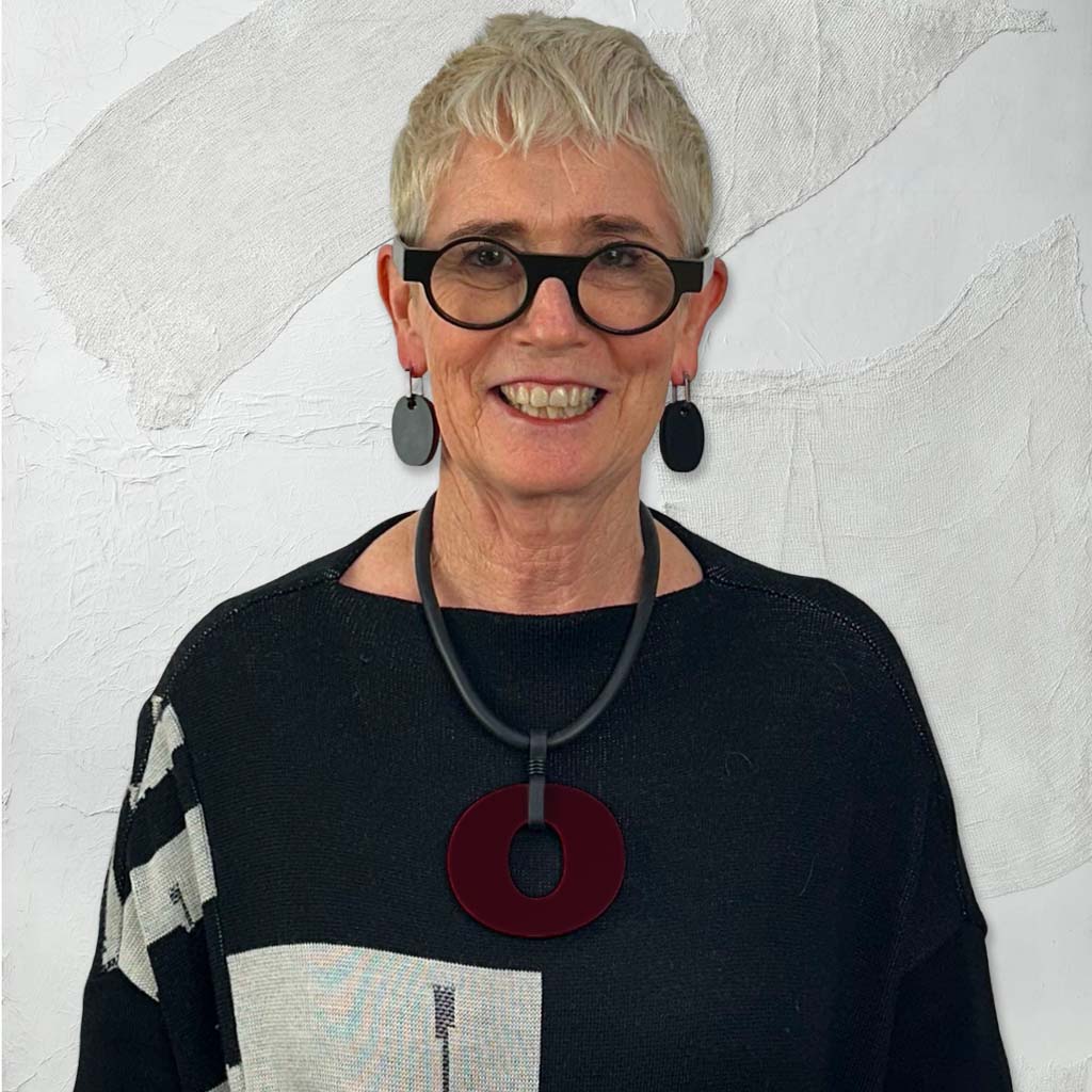 Rowan wearing reversible perspex O necklace and perspex earrings for Frank Idea