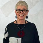 Rowan wearing reversible perspex O necklace and perspex earrings for Frank Idea