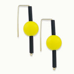 yellow rubber earrings made with sterling silver. Bold, fun design.